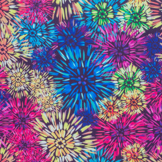 Polyester silk fabric with an illustration of fireworks in a range of colours, including blue, purple and yellow.