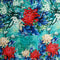 Polyester silk fabric with red, blue and white chrysanthemum flowers on a blue background.