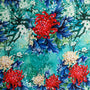 Polyester silk fabric with red, blue and white chrysanthemum flowers on a blue background.