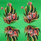 Polyester silk fabric with flaming flowers in bloom on a vibrant green.