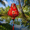The lantern has a teardrop-like shape, a black wooden tail, and a red tassel hanging from the bottom, enhancing its traditional charm.
