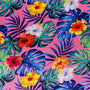 Polyester silk fabric used to create Hoi An Lanterns featuring vibrant hibiscus flowers in various shades of colours on bright pink background. 