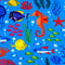 Blue polyester silk fabric with a print of colourful tropical fish, sea horses and jellyfish swimming around bright orange and red coral.